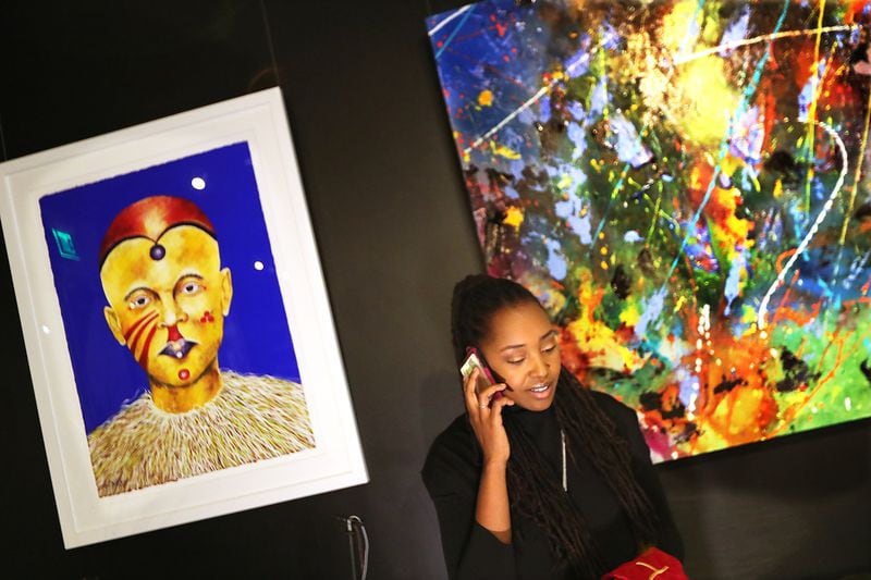 Owner Lakeysha Hallmon works to open her store The Village at Ponce City Market that will include curated art work from Zucot Gallery for sale on Monday, Nov 23, 2020, in Atlanta. “Curtis Compton / Curtis.Compton@ajc.com”
