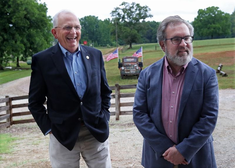 U.S. Environmental Protection Agency (EPA) Administrator Andrew Wheeler (right) shares a laugh with Georgia Agriculture Commissioner Gary Black (left) while kicking off his Georgia swing at Southern Belle Farm on Wednesday, May 27, 2020, in McDonough. Curtis Compton ccompton@ajc.com